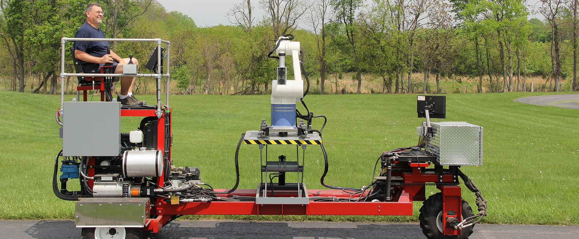 A technician drives the Robotic System for Tree Shape Estimation prototype system 