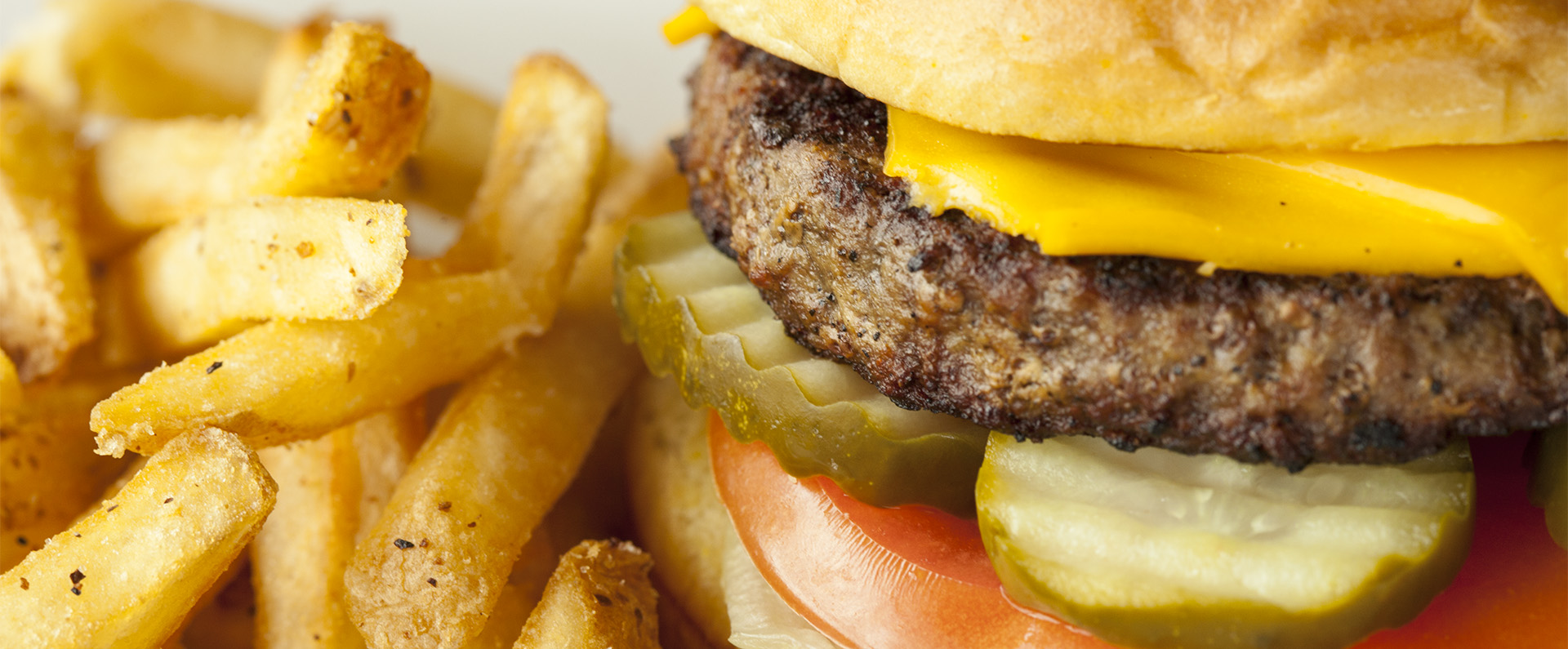 A cheeseburger and French fries